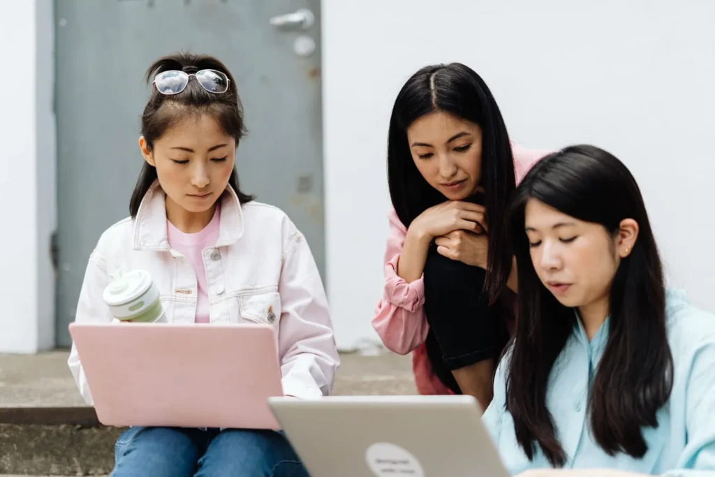 Students learning on laptops